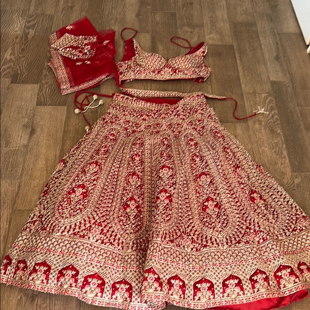 Red and silver Embroidered Lehenga Set